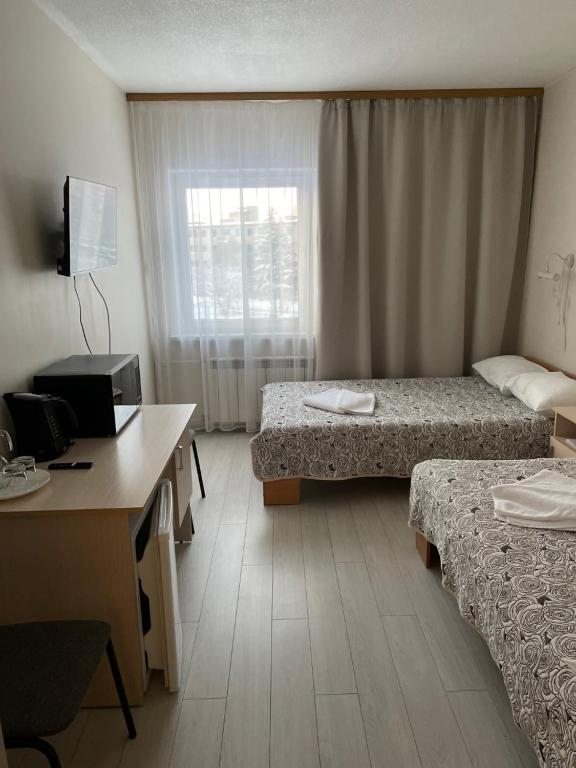 Двухместный (Двухместный номер с 2 отдельными кроватями) отеля Светогорск
