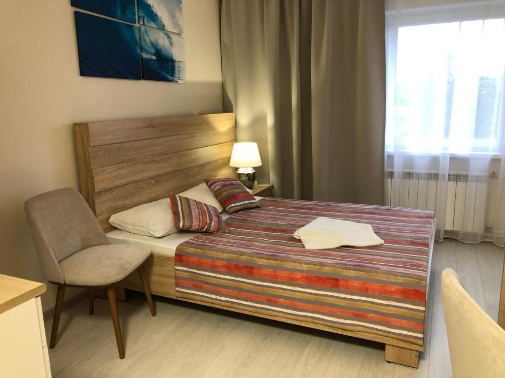 Двухместный (Улучшенный двухместный номер с 1 кроватью) отеля Светогорск