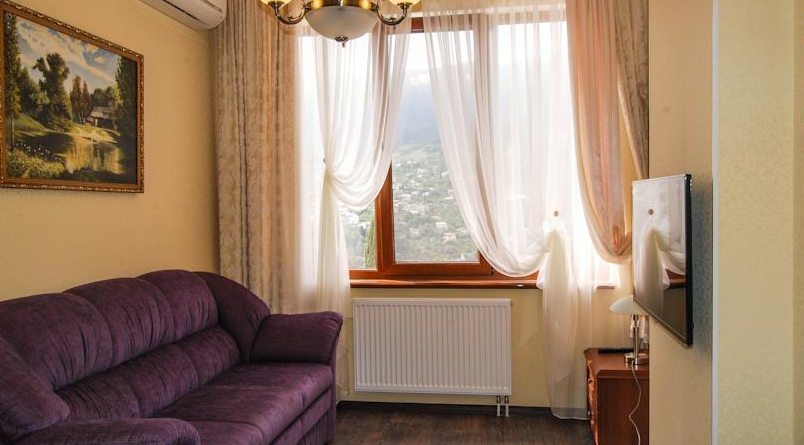 Апартаменты с одной спальней: гостиная. Мини-отель Yalta Flat