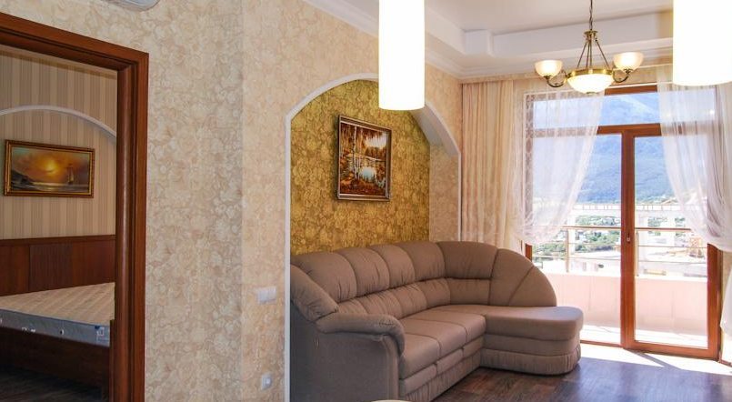 Апартаменты с двумя спальнями: гостиная. Мини-отель Yalta Flat