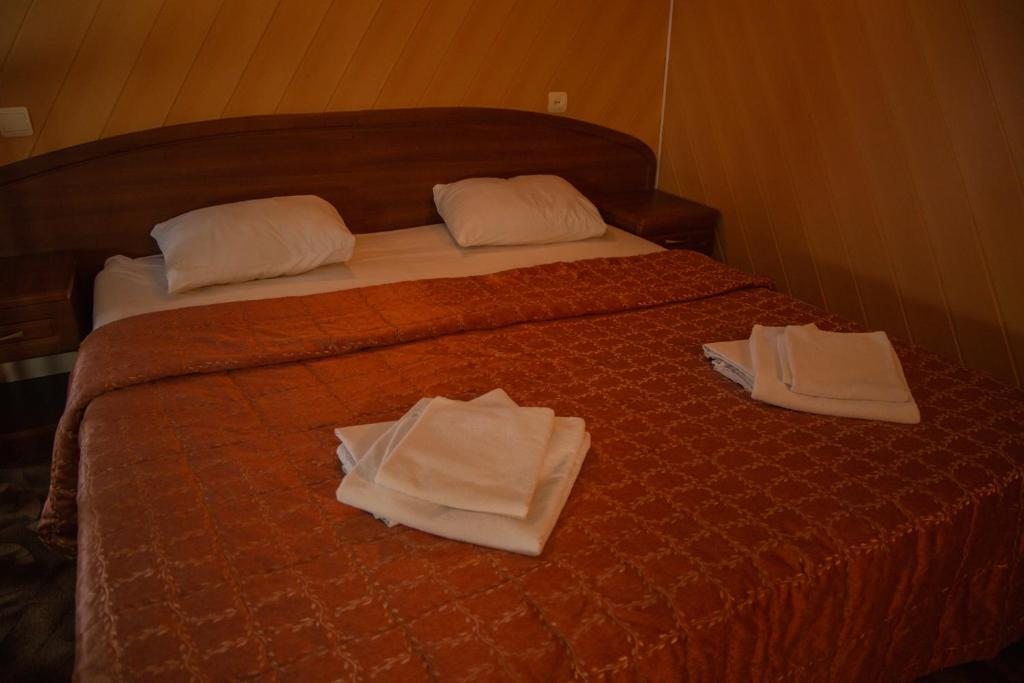 Двухместный (Улучшенный двухместный номер с 2 отдельными кроватями) гостиницы Евразия-Аксай