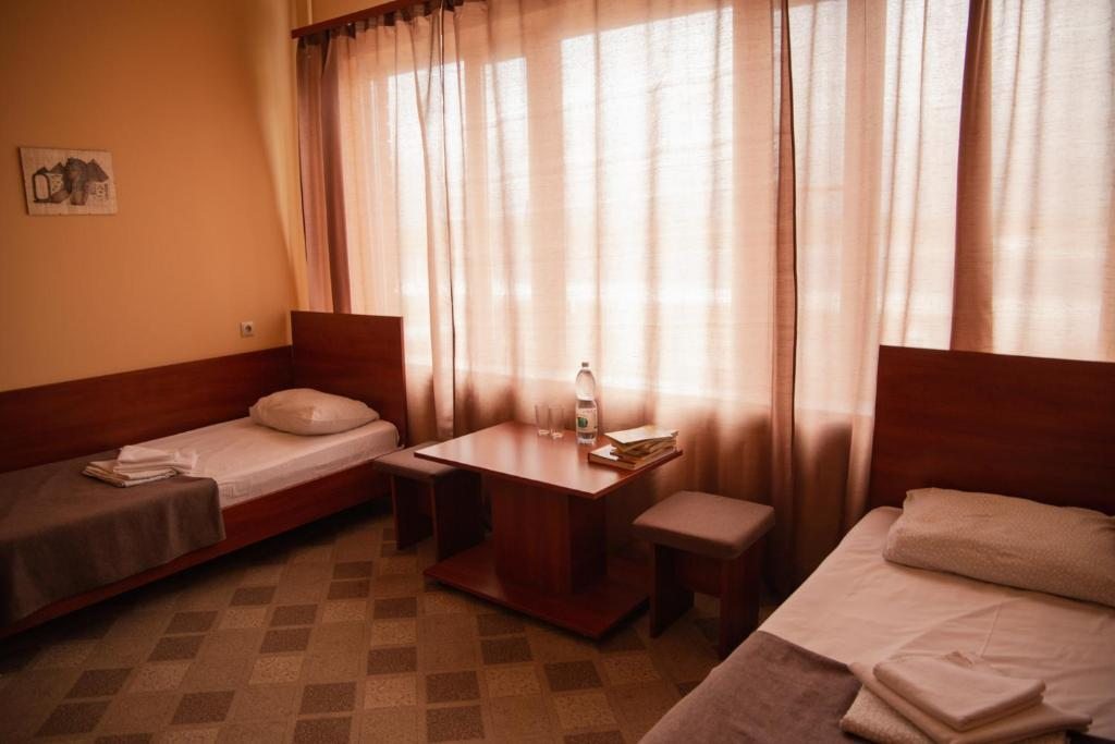 Двухместный (Небольшой двухместный номер с 2 отдельными кроватями) гостиницы Евразия-Аксай