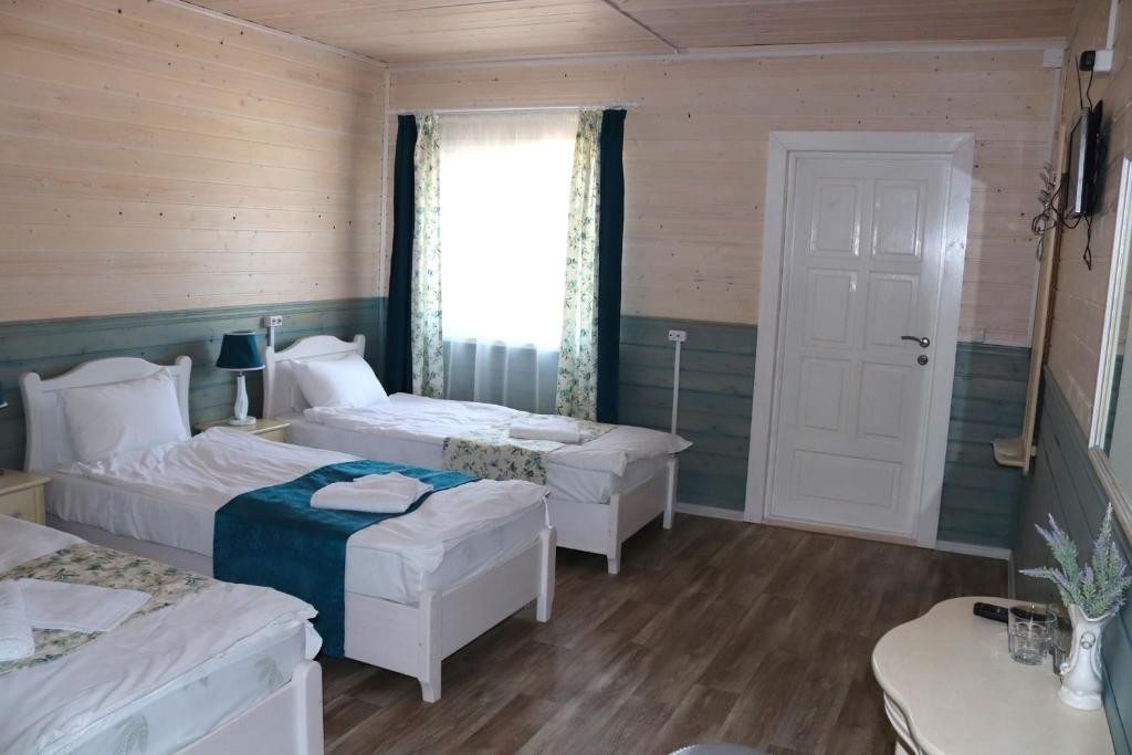 Двухместный (Стандартный двухместный номер с 1 кроватью или 2 отдельными кроватями и видом на море) туристического комплекса СаРайский, Хужир