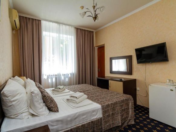 Фотография номера гостиницы Шарм