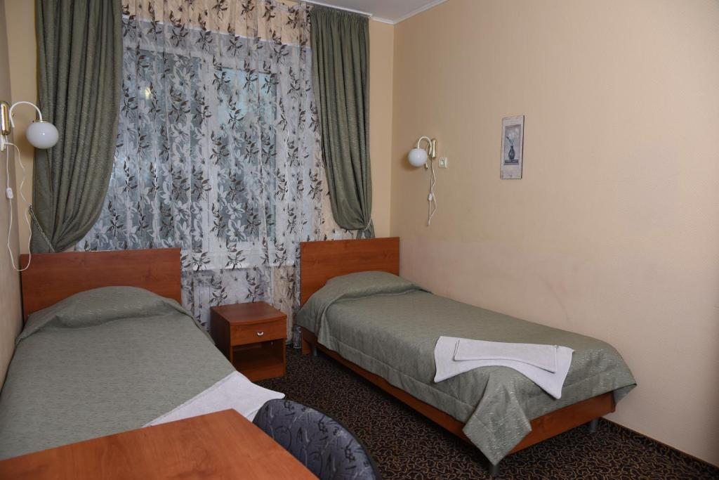 Двухместный (Стандартный двухместный номер с 2 отдельными кроватями) отеля Альфа, Уфа