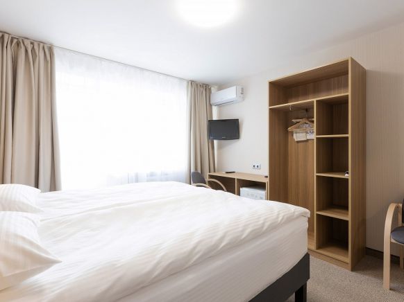 Фотография номера гостиницы АМАКС Сити-отель