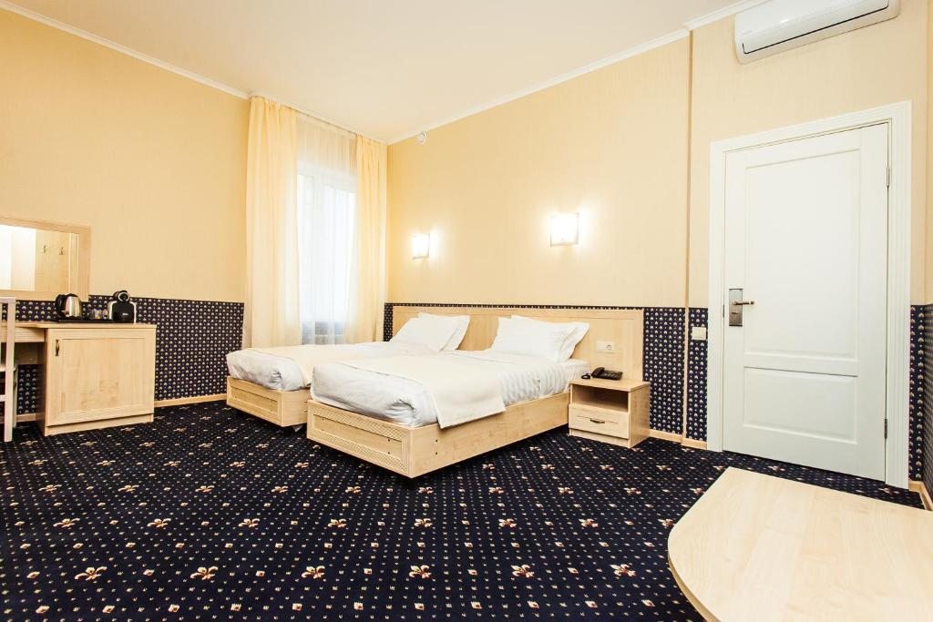 Двухместный (Двухместный номер Делюкс с 1 кроватью или 2 отдельными кроватями) отеля МИРА, Москва