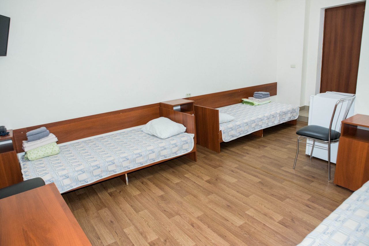 Кровать в трёхместном номере