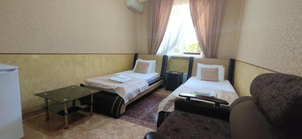 Двухместный (Номер Люкс с 2 отдельными кроватями + кресло кровать.) отеля Миракль, Вардане