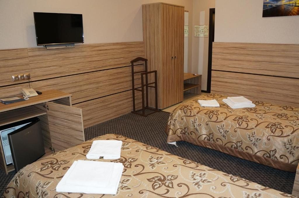Двухместный (Стандартный двухместный номер с 2 отдельными кроватями) отеля Аврора, Ачинск