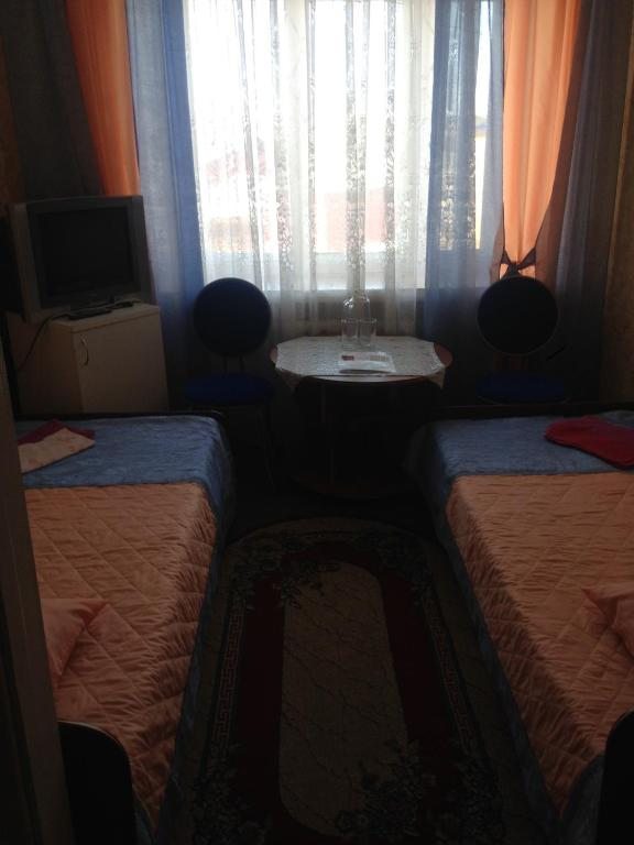 Двухместный (Бюджетный двухместный номер с 2 отдельными кроватями) гостиницы Горняк, Воркута