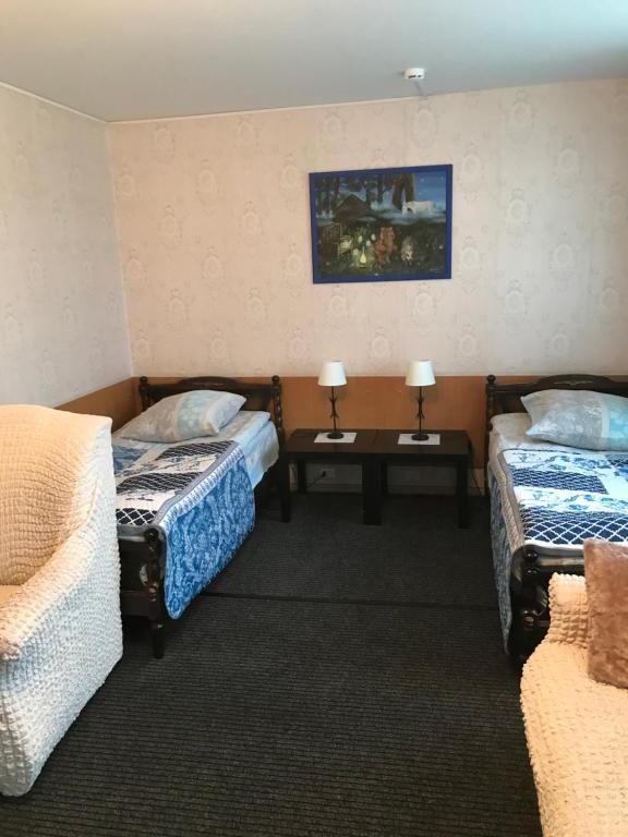 Двухместный (Улучшенный двухместный номер с 2 отдельными кроватями) отеля Волгореченск