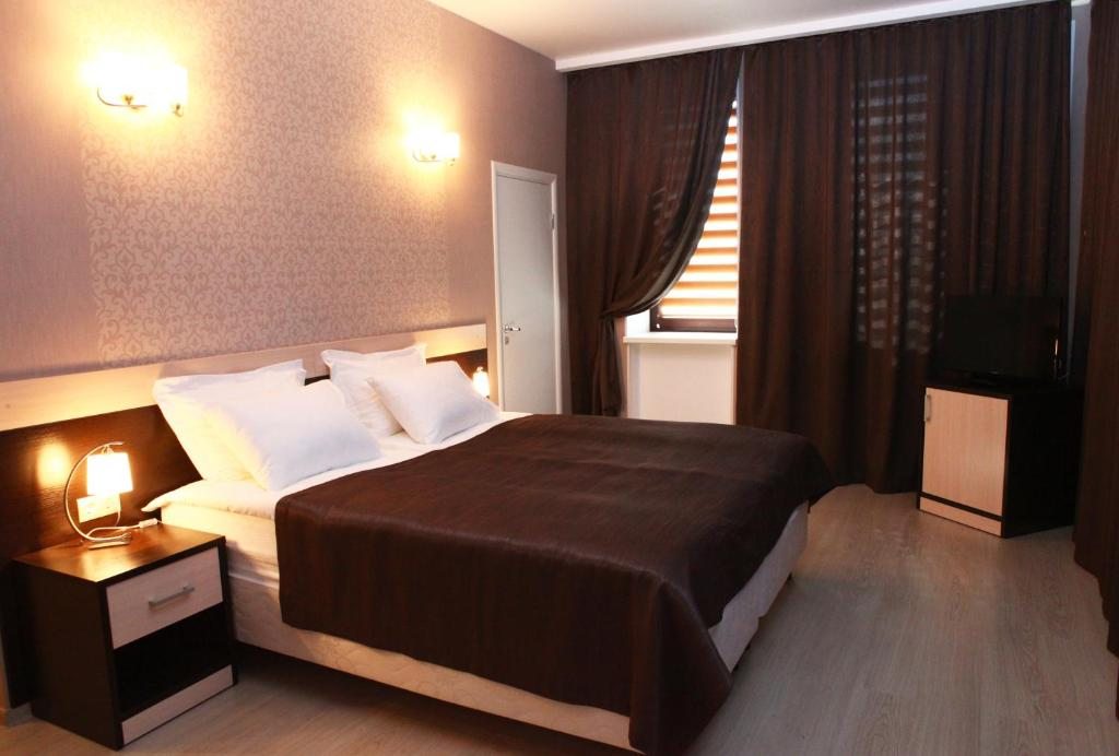 De Luxe (С 1 кроватью и балконом) гостиницы Спутник, Омск