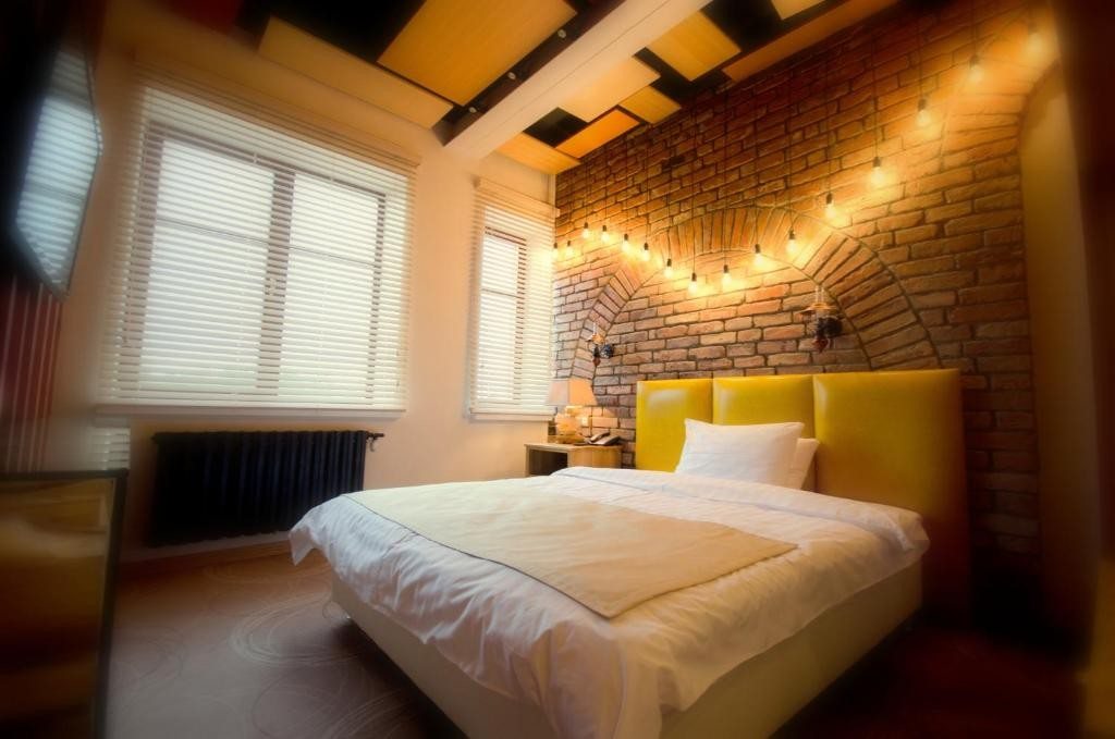 Двухместный (Улучшенный двухместный номер с 1 кроватью или 2 отдельными кроватями) гостиничного комплекса Wardenclyffe Volgo-Balt, Вытегра