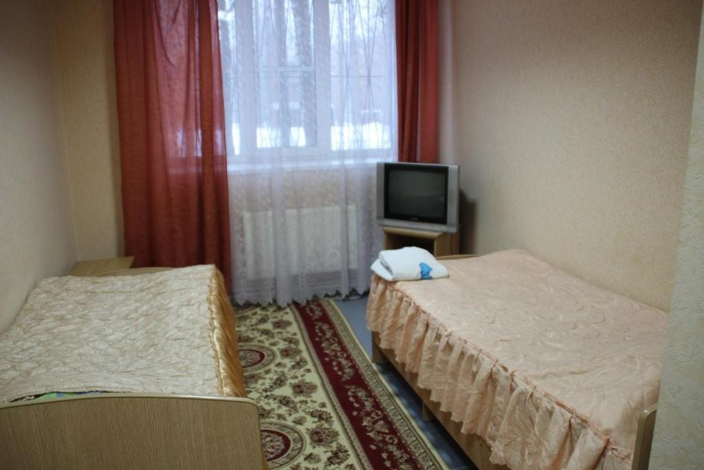 Двухместный (Двухместный номер с 2 отдельными кроватями и собственной ванной комнатой) отеля Люкс, Арзамас