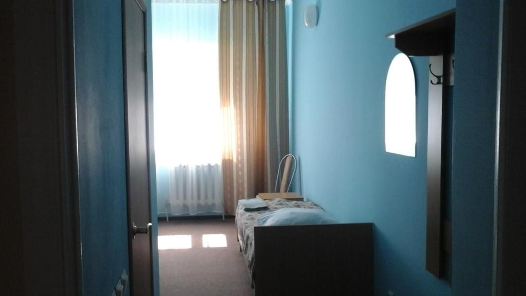 Двухместный (Бюджетный двухместный номер с 2 отдельными кроватями) отеля Лесная, Ханты-Мансийск