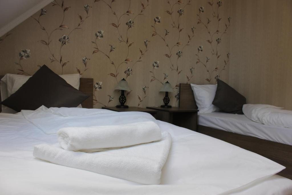 Двухместный (Двухместный номер с 2 отдельными кроватями и дополнительной кроватью) отеля Waldhauzen, Черняховск