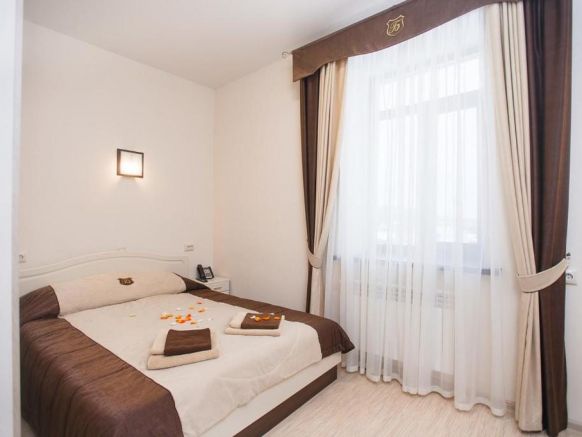 Фотография номера гостиницы Три А