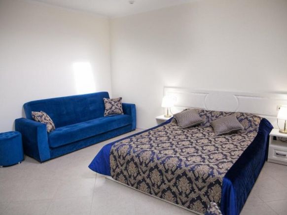 Фотография номера гостиницы Три А