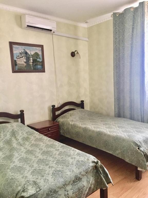 Двухместный (Двухместный номер с 2 отдельными кроватями и душем) мотеля Рябинушка, Богородицк