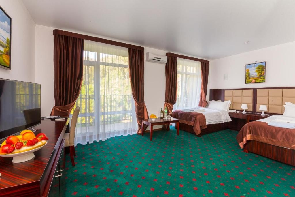 Двухместный (Улучшенный двухместный номер с 1 кроватью или 2 отдельными кроватями) курортного отеля Wellness Gagra, Гагра