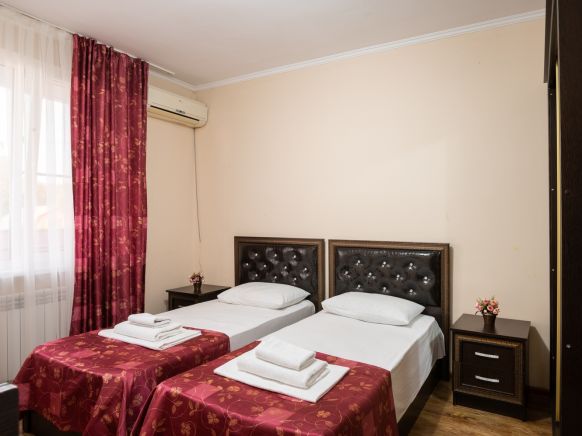 Фотография номера гостиницы Сансэт-Хилл