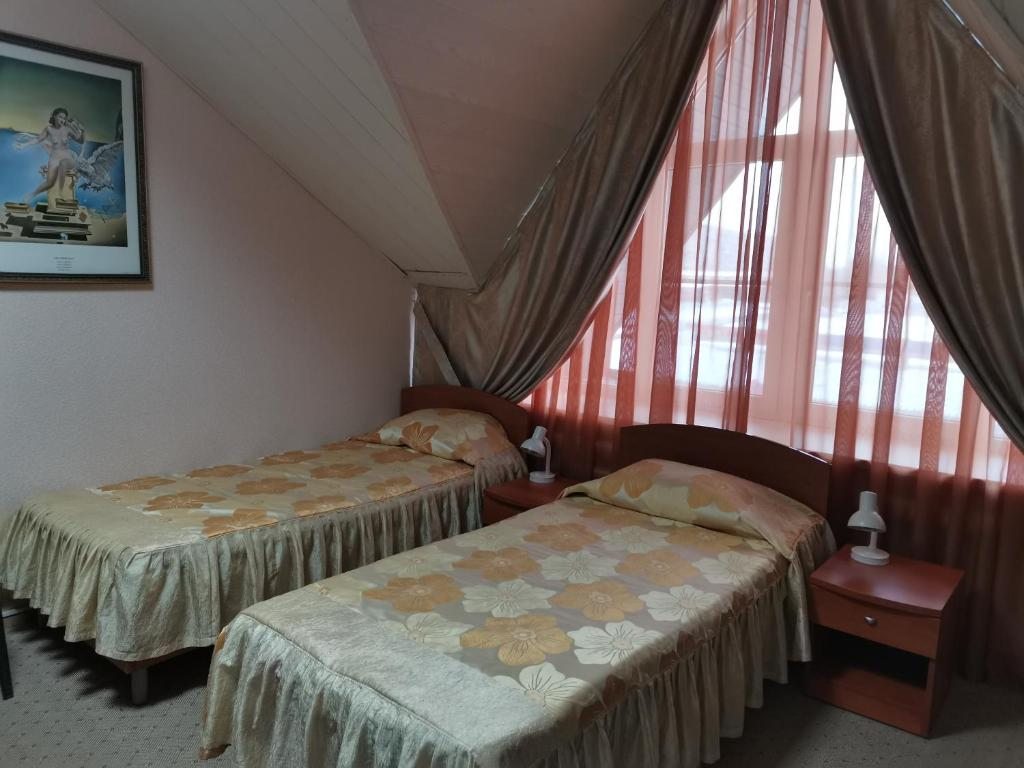 Двухместный (Стандартный номер с двумя односпальными кроватями) гостиницы Koтто, Волгоград