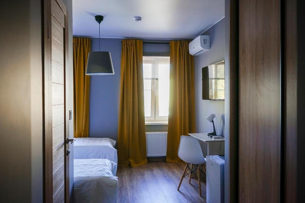 Двухместный (Улучшенный двухместный номер с 1 кроватью или 2 отдельными кроватями) отеля Ясенки, Львово (Подольский район)