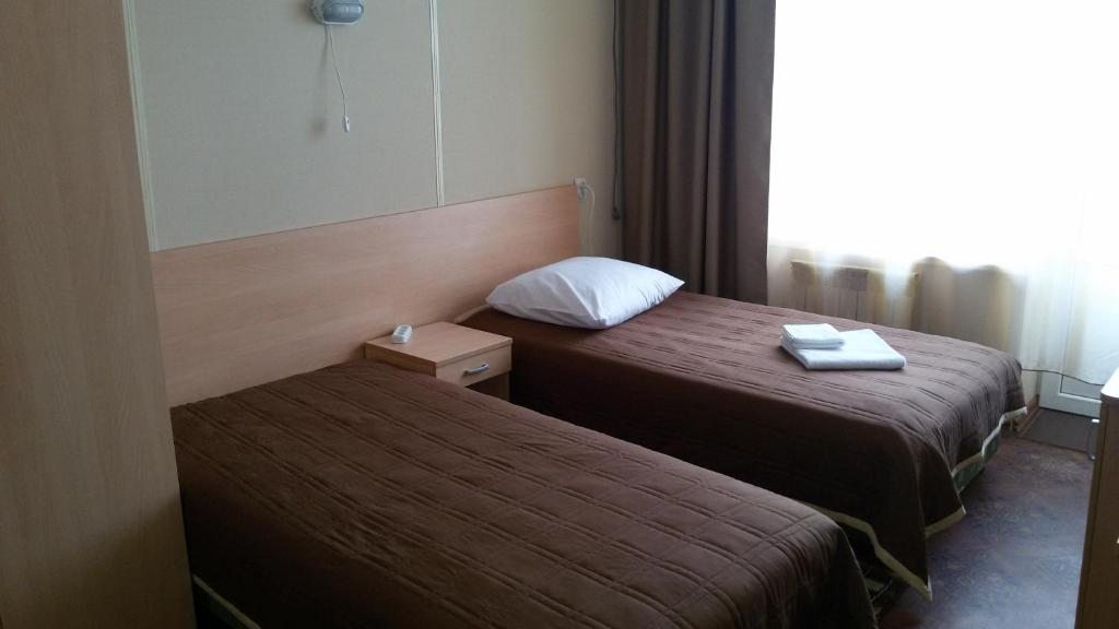 Двухместный (Стандартный двухместный номер с 2 отдельными кроватями) отеля Солнечный Ветер, Новозыбков