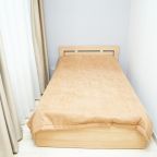 Спальная комната в номере 5 Люкс