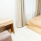 Спальная комната в номере 5 Люкс