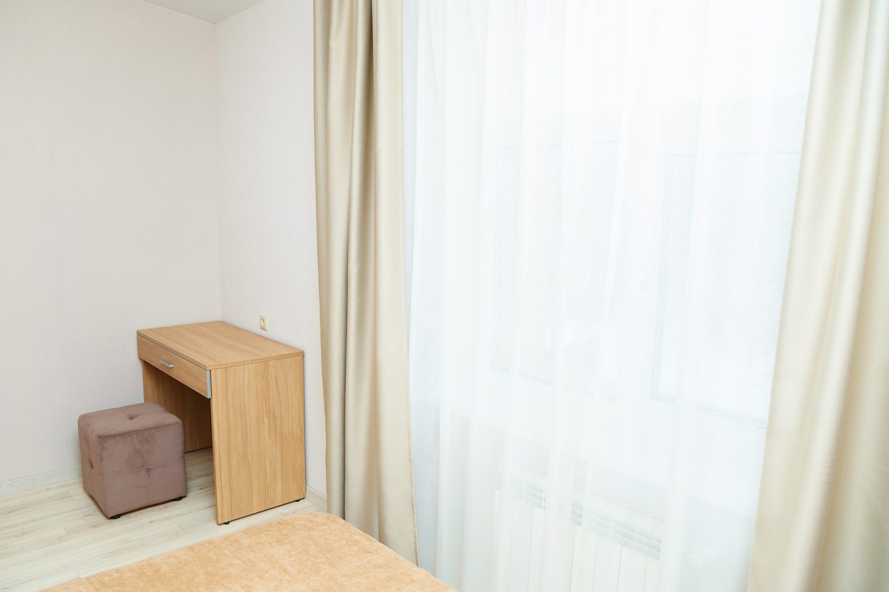 Спальная комната в номере 5 Люкс