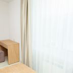 Спальная комната в номере 5 Люкс