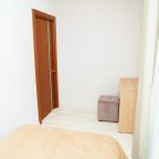 Спальная комната в номере 5 Люкс