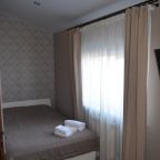 Полотенца и халаты