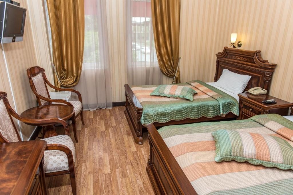Двухместный (Стандартный двухместный номер с 2 отдельными кроватями - Пакет спа-услуг) отеля Атриум Виктория, Сухум