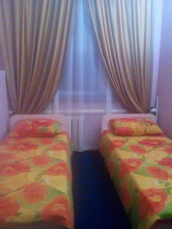 Двухместный (Двухместный номер с 2 отдельными кроватями и душем) мини-гостиницы Маяк Инн, Красноярск