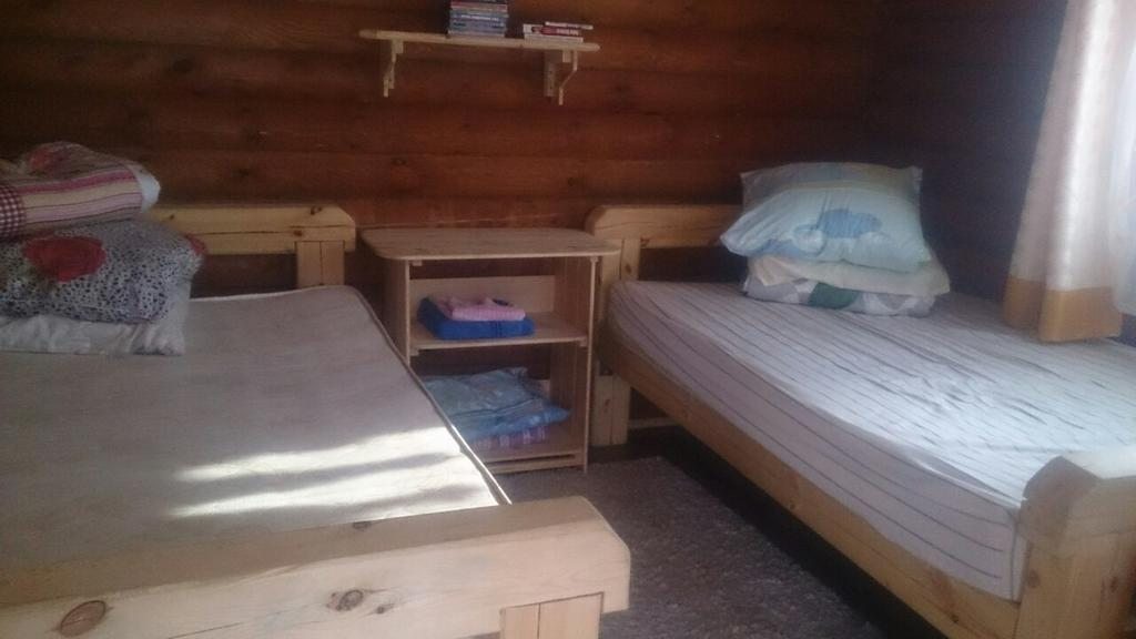 Двухместный (Большой двухместный номер с 2 отдельными кроватями) гостевого дома Байкальская заимка, Мангутай
