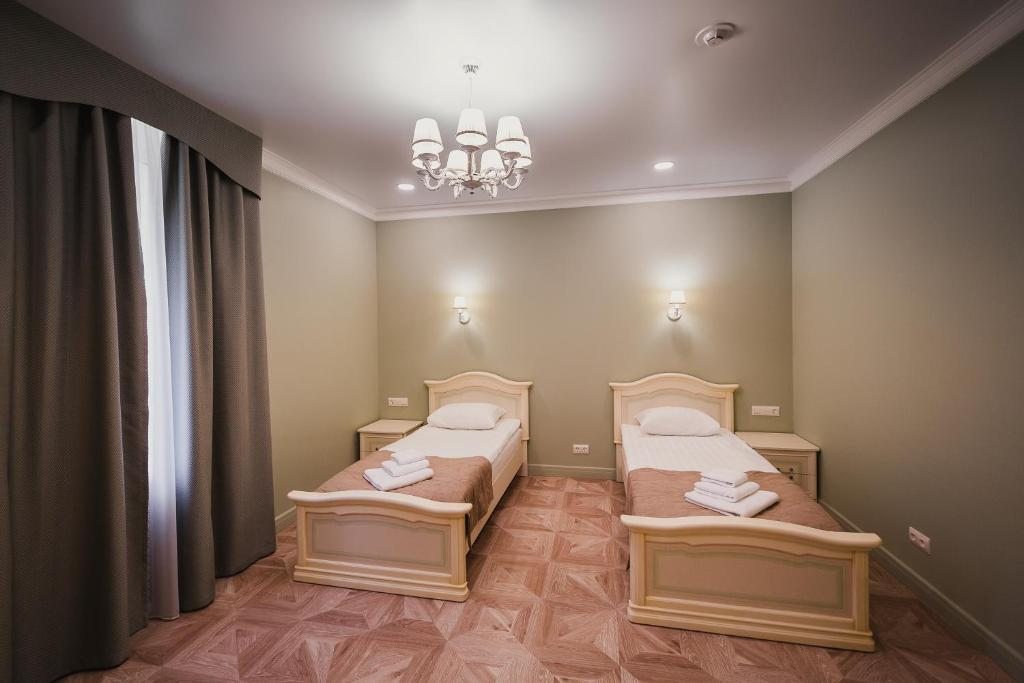 Двухместный (Двухместный номер «Комфорт» с 2 отдельными кроватями) гостиницы Ренессанс, Мурманск