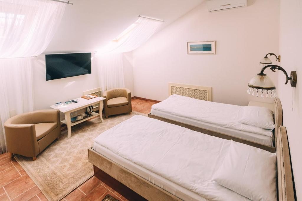 Двухместный (Стандартный двухместный номер с 2 отдельными кроватями) отеля Усадьба, Смоленск
