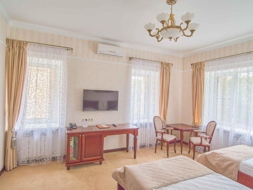 Двухместный (Улучшенный двухместный номер с 2 отдельными кроватями) отеля Усадьба, Смоленск