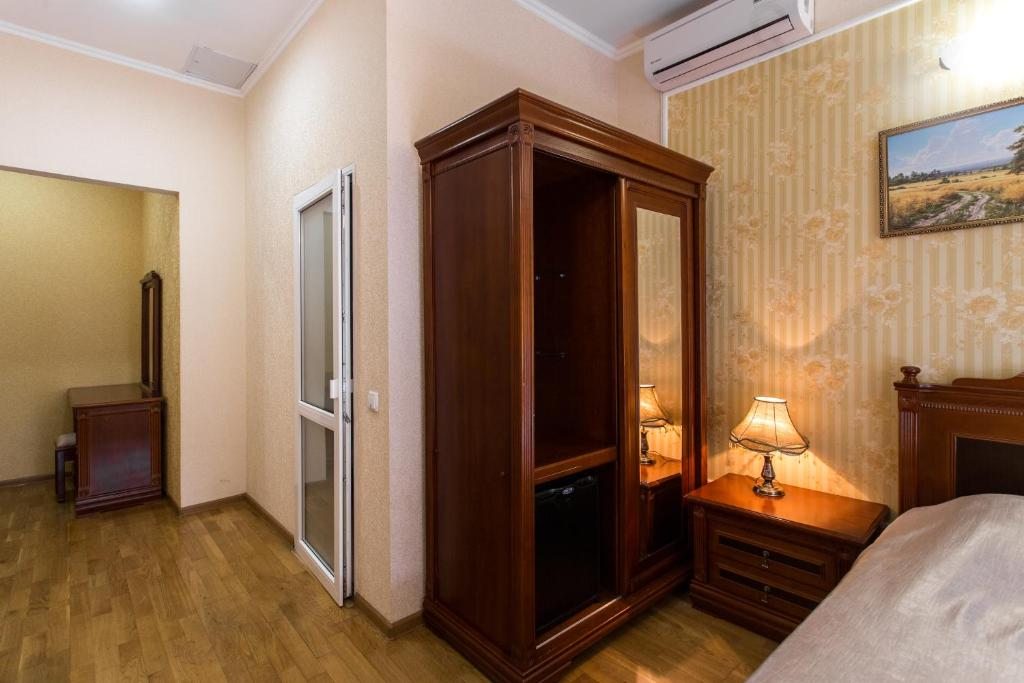 Одноместный (Одноместный бюджетный номер с вентилятором) отеля Олимп, Сухум
