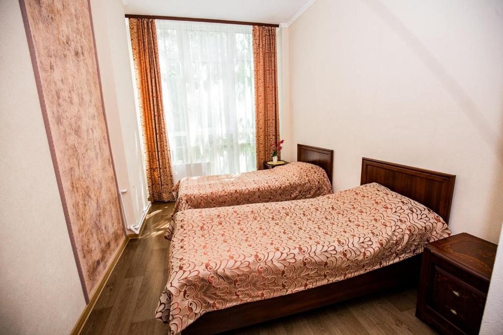 Двухместный (Стандартный двухместный номер с 2 отдельными кроватями) отеля Ольгино, Конаково