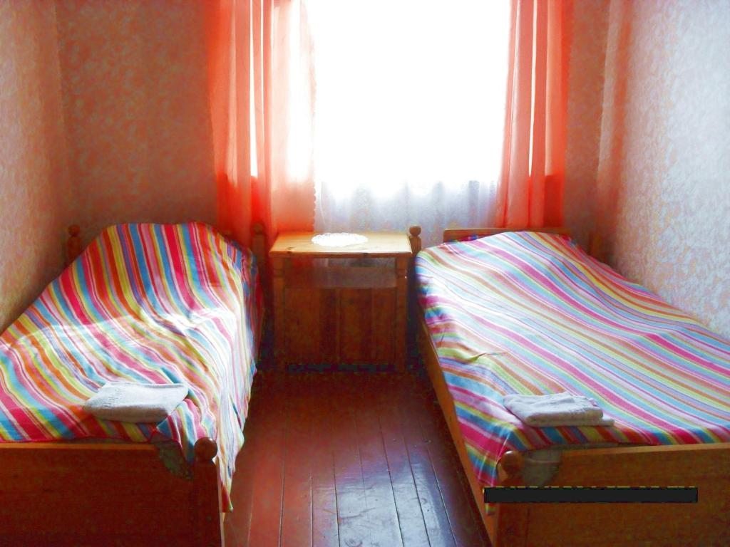 Двухместный (Бюджетный двухместный номер с 2 отдельными кроватями) гостевого дома Андреевщина, Новая Ладога