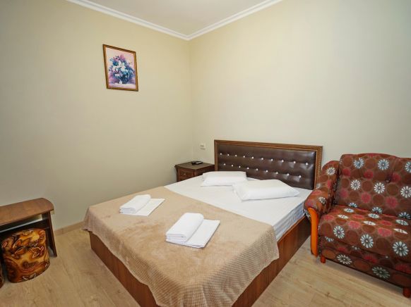 Фотография номера гостиницы Золотая Лилия