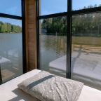 Дом на воде с панорамным окном и сауной