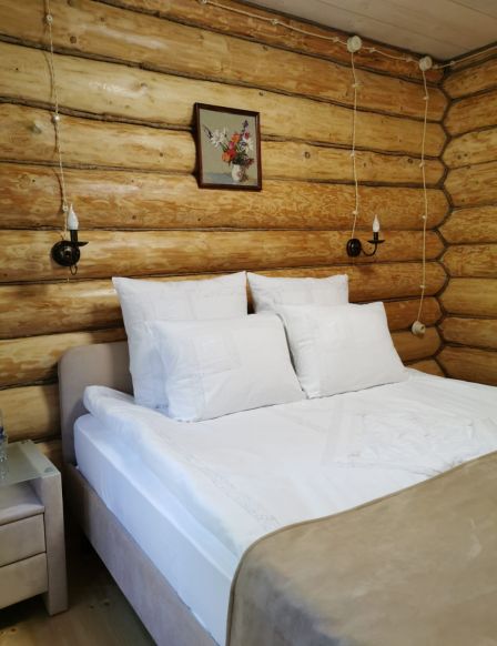 Фотография номера гостиницы Удивительная Деревня Мандроги