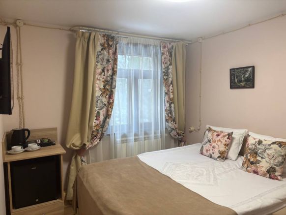 Фотография номера гостиницы Удивительная Деревня Мандроги