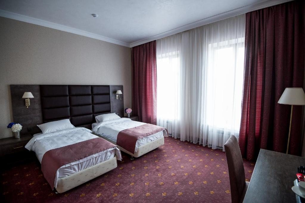 Двухместный (Двухместный номер с 2 отдельными кроватями) отеля Парк отель, Черкесск