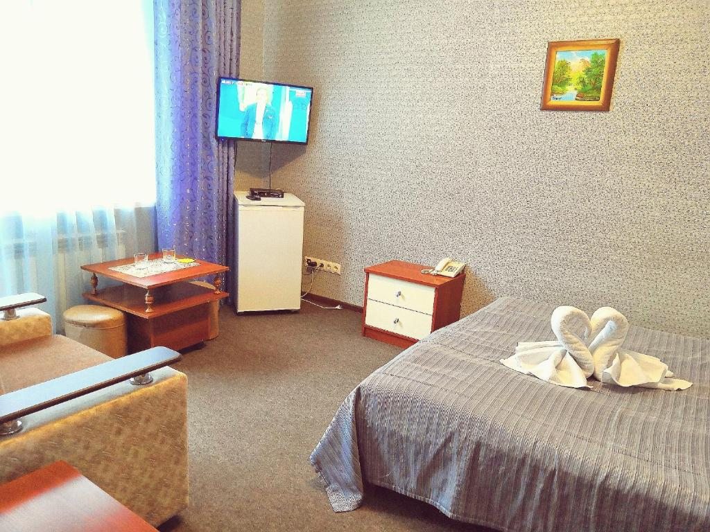 Двухместный (Улучшенный двухместный номер с 1 кроватью или 2 отдельными кроватями) гостиницы Фотон, Домбай